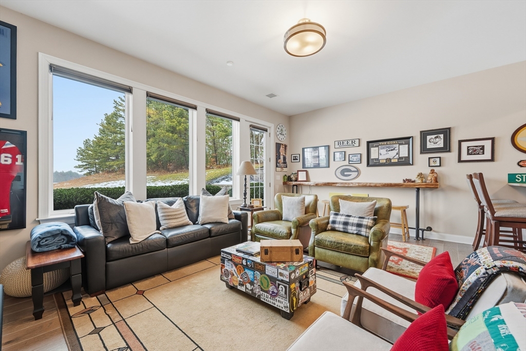 187 Rhode Island Road Lakeville, MA 02347 - Photo 30 of 42 a living room with furniture and a large window