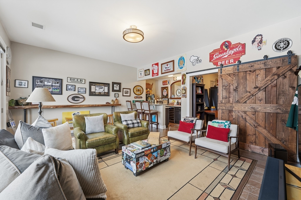 187 Rhode Island Road Lakeville, MA 02347 - Photo 31 of 42 a living room with furniture and rug