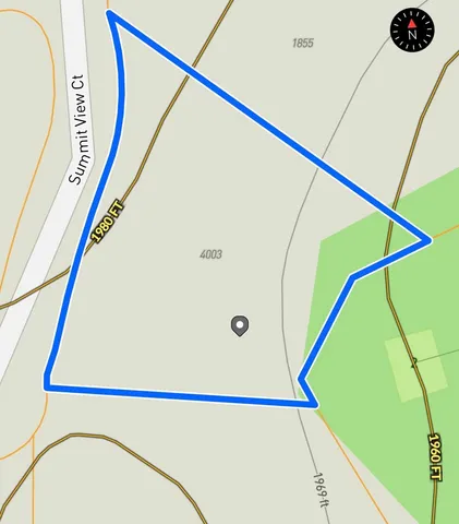 a view of a house with a yard and garden