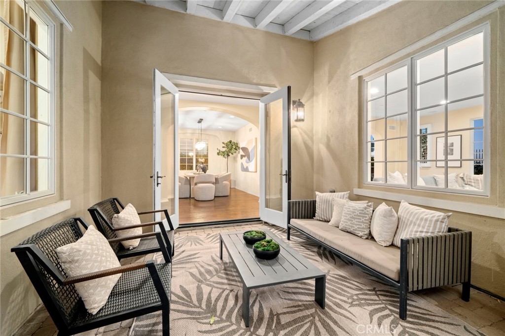 46 Silhouette Irvine, CA 92603 - Photo 16 of 42 a living room with furniture and a large window