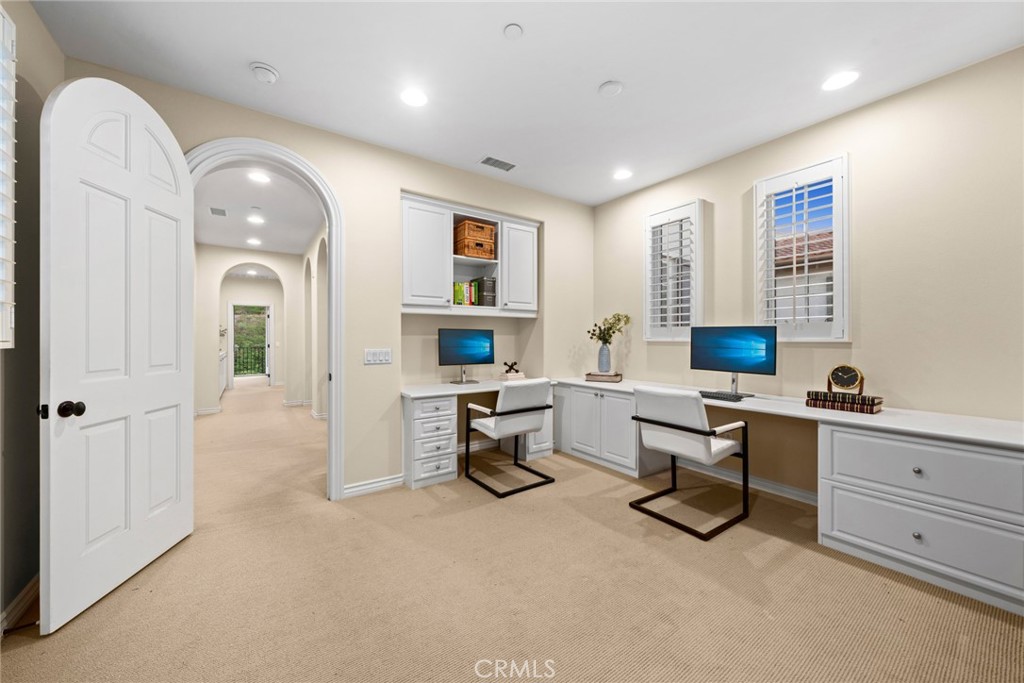 46 Silhouette Irvine, CA 92603 - Photo 32 of 42 a view of a livingroom with workspace and windows