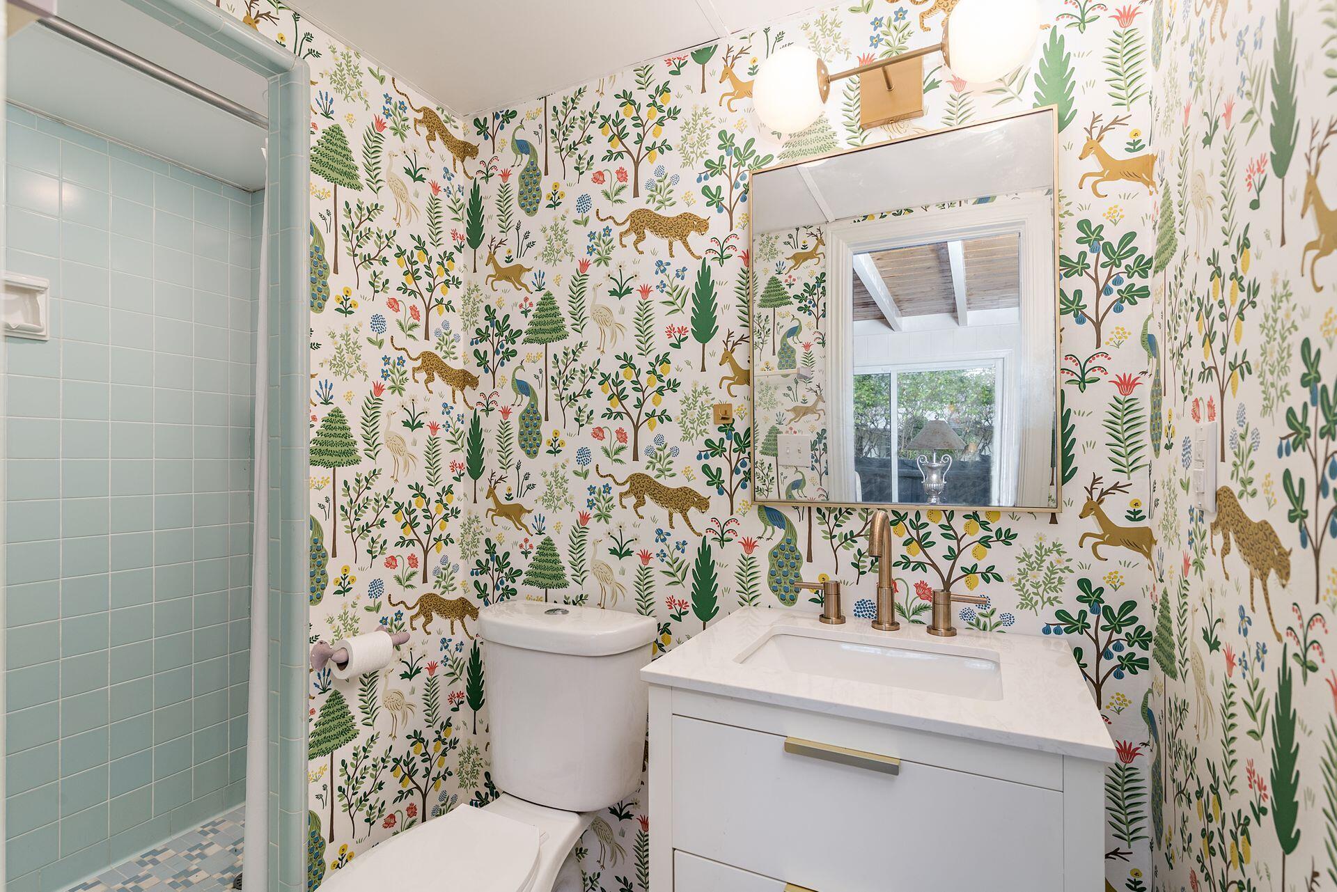 240 Almeria Road West Palm Beach, FL 33405 - Photo 16 of 24 a bathroom with a sink toilet and shower