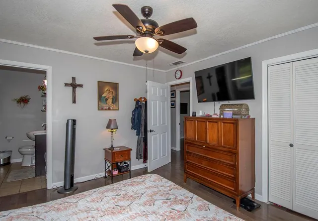 a room with furniture and a flat screen tv