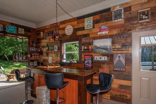 a table and chairs in front of a building