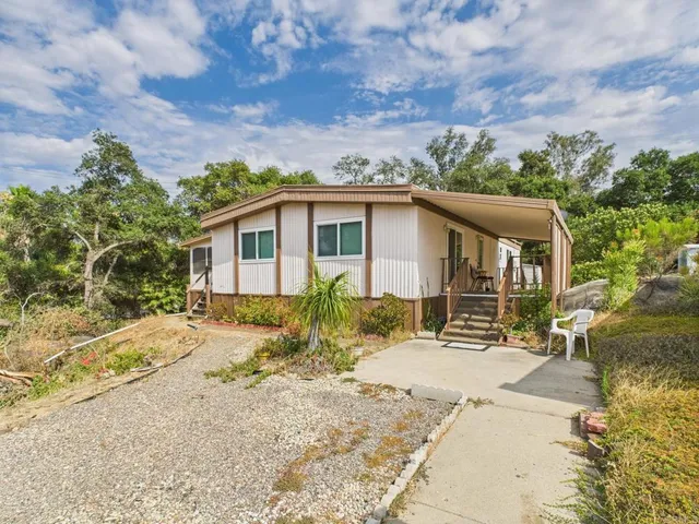 a view of a house with a patio