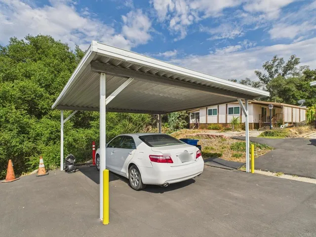a view of swimming pool with seating space