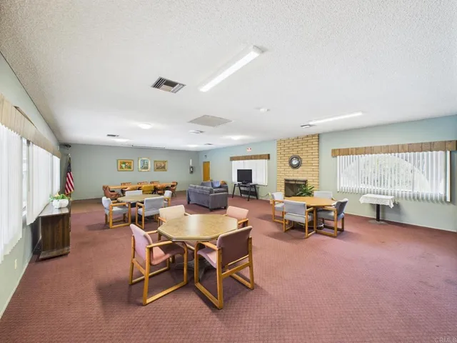 a kitchen with stainless steel appliances granite countertop a refrigerator stove and sink