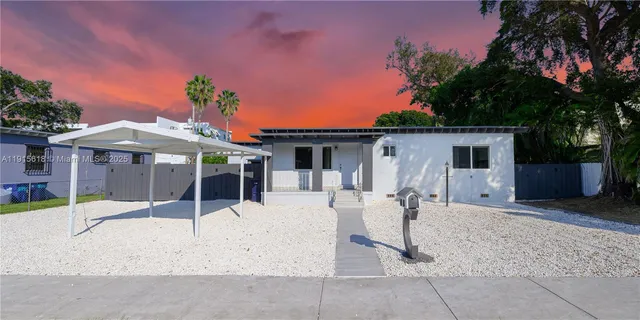front view of a house with a patio