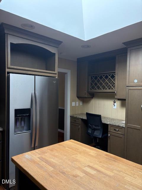 4408 Boxwood Road Raleigh, NC 27612 - Photo 3 of 7 a kitchen with a refrigerator and a sink