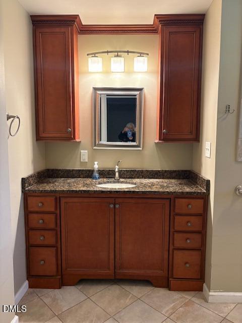 4408 Boxwood Road Raleigh, NC 27612 - Photo 6 of 7 a living room with granite countertop a fireplace and a sink