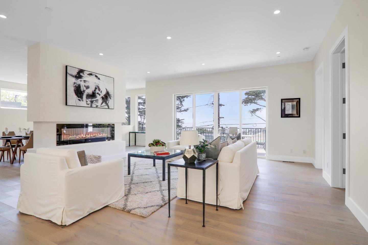 428 San Pablo Terrace Pacifica, CA 94044 - Photo 17 of 43 a living room with furniture and a large window