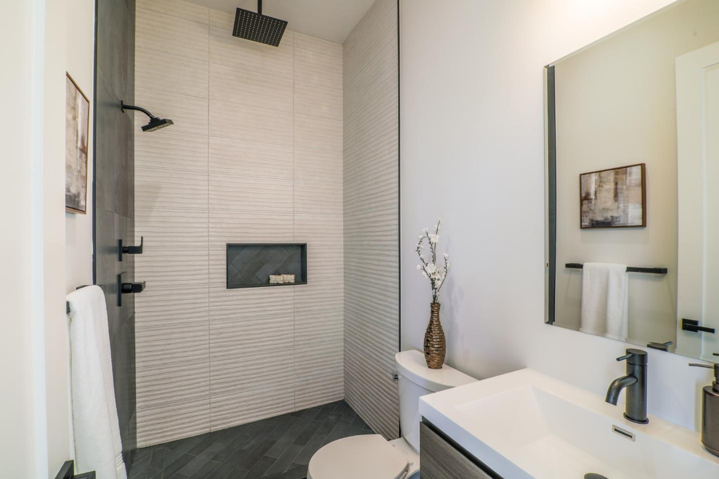 428 San Pablo Terrace Pacifica, CA 94044 - Photo 21 of 43 a bathroom with a sink toilet and mirror