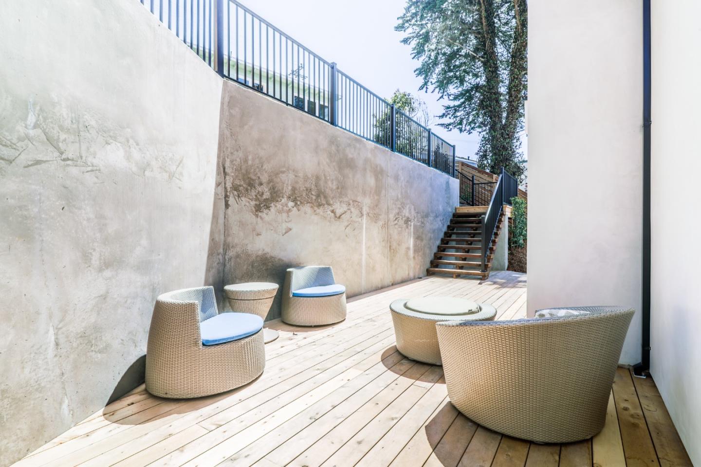 428 San Pablo Terrace Pacifica, CA 94044 - Photo 23 of 43 a living room with furniture and a potted plant
