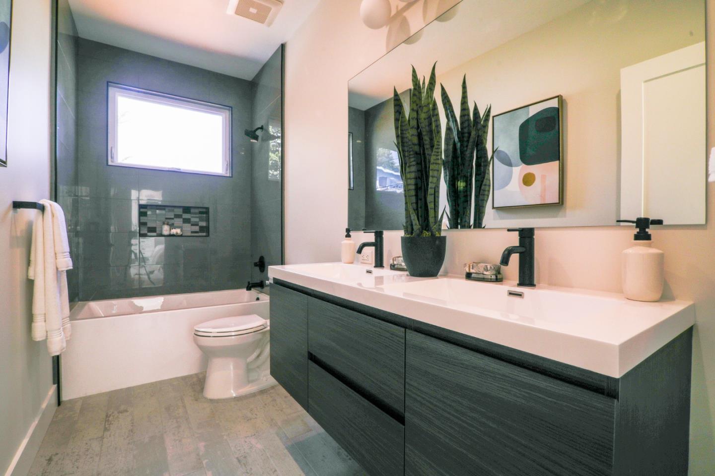 428 San Pablo Terrace Pacifica, CA 94044 - Photo 25 of 43 a bathroom with a toilet sink and mirror