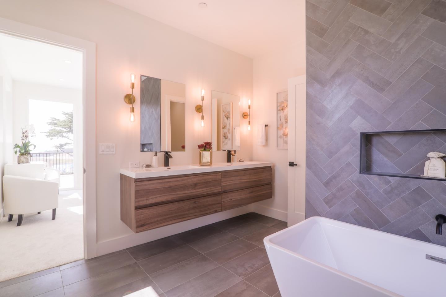 428 San Pablo Terrace Pacifica, CA 94044 - Photo 31 of 43 a bathroom with a bathtub sink and mirror