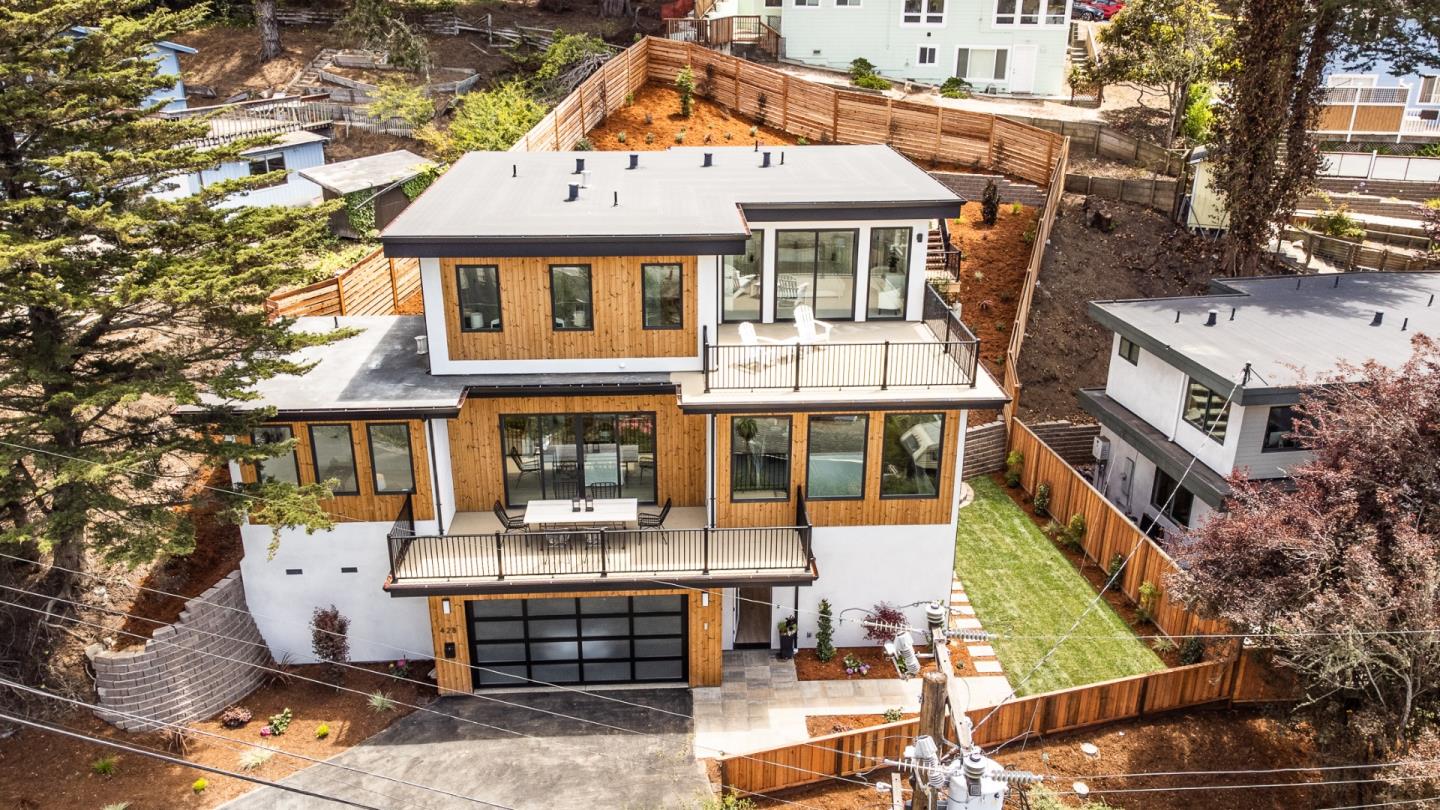 428 San Pablo Terrace Pacifica, CA 94044 - Photo 35 of 43 a front view of a house with street