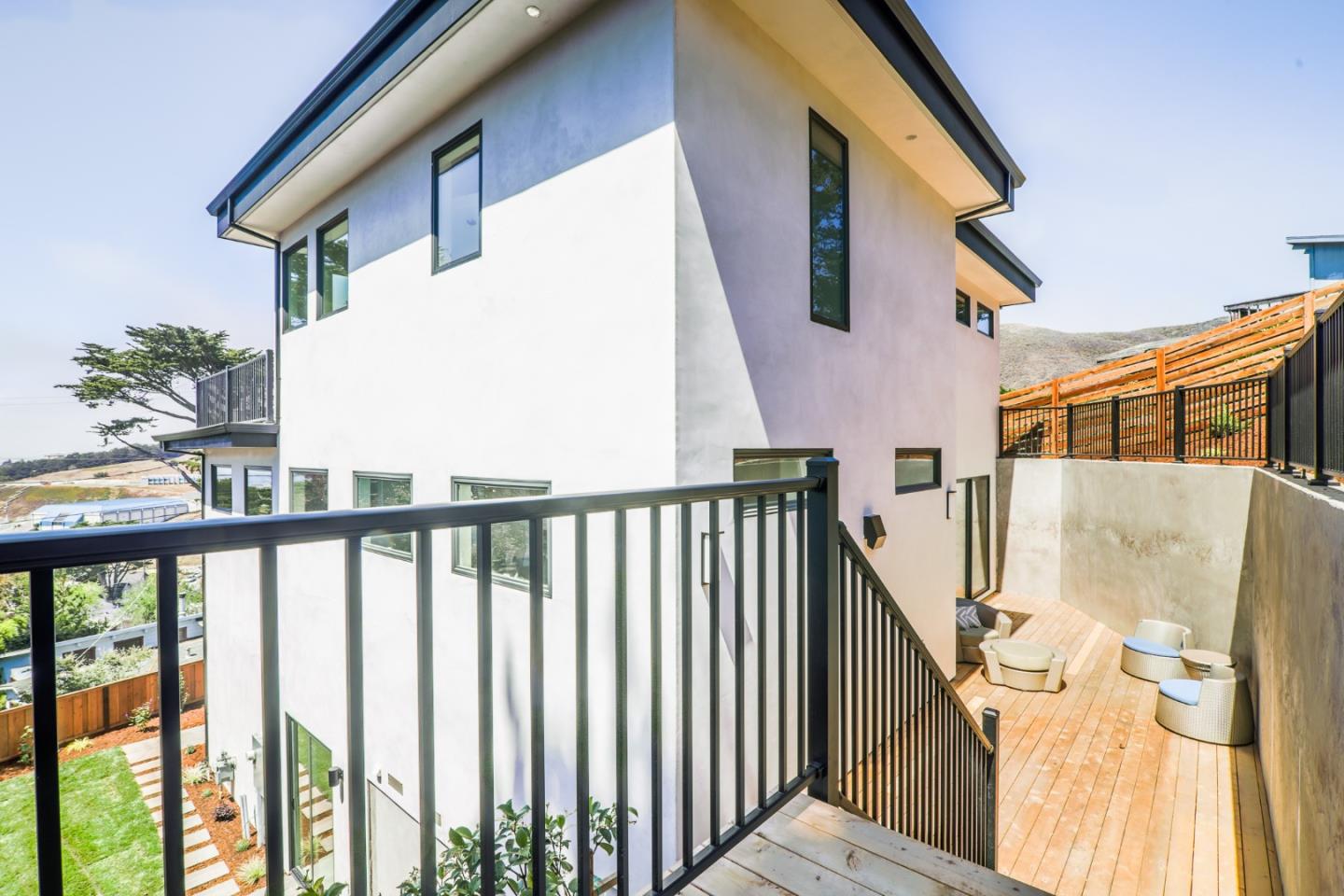 428 San Pablo Terrace Pacifica, CA 94044 - Photo 40 of 43 a view of a balcony with wooden floor and fence