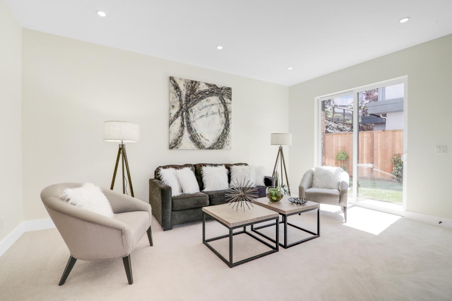 428 San Pablo Terrace Pacifica, CA 94044 - Photo 4 of 43 a living room with furniture and a large window
