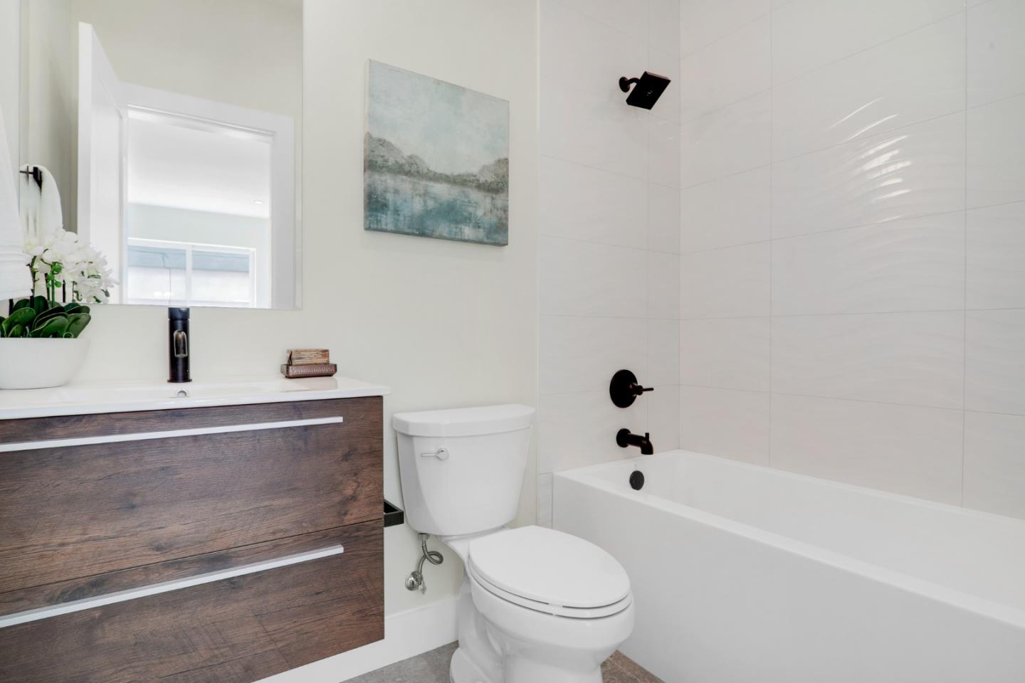428 San Pablo Terrace Pacifica, CA 94044 - Photo 6 of 43 a bathroom with a sink a toilet and shower