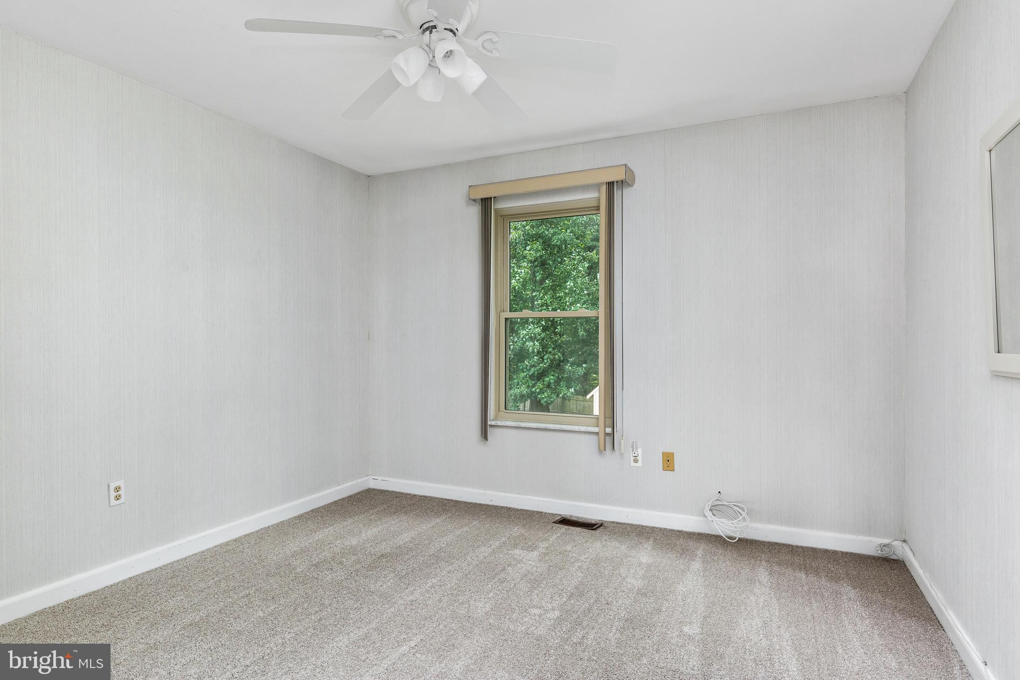 29 Christopher Road Voorhees, NJ 08043 - Photo 22 of 28 an empty room with a window