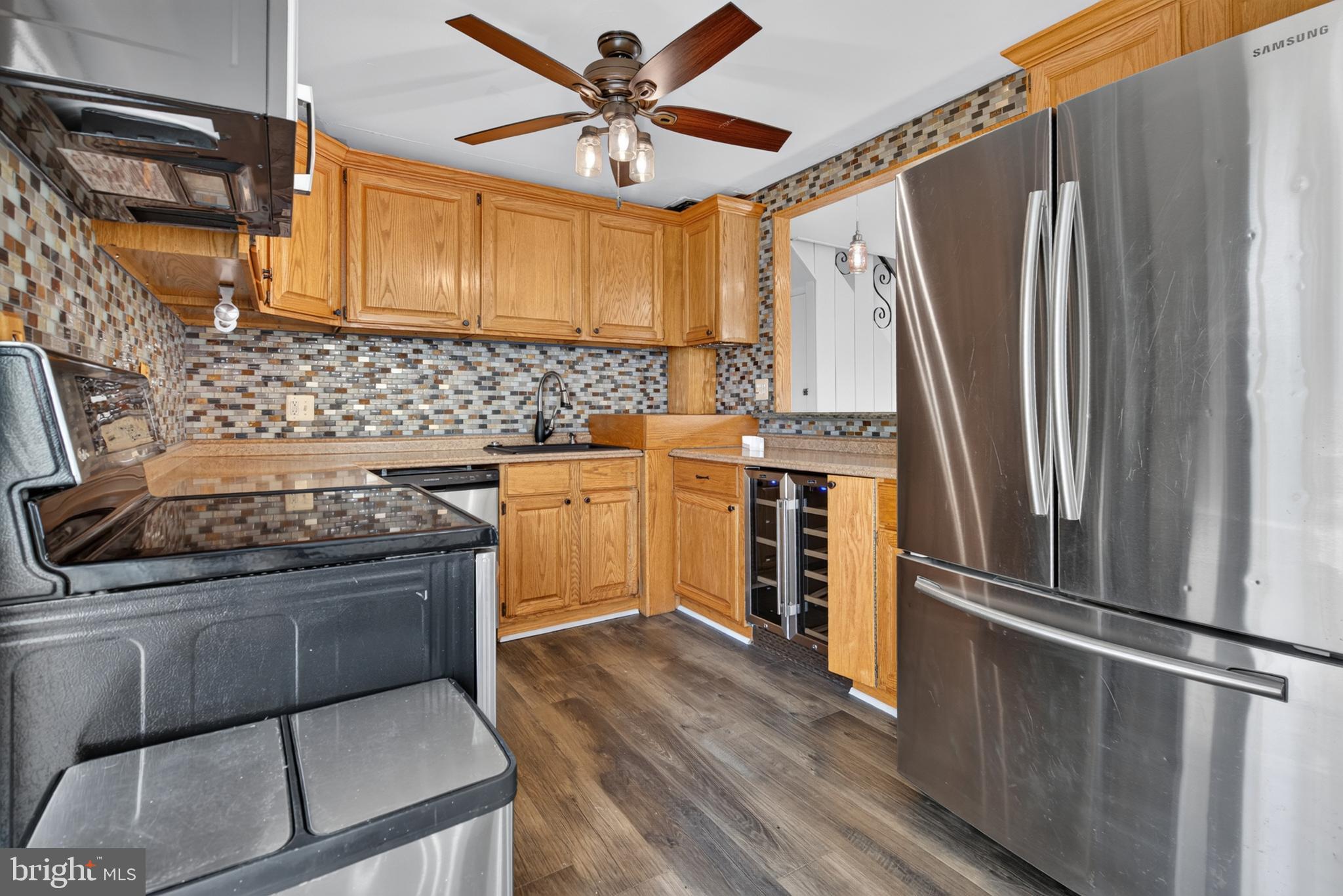 10 Indian Red Road Levittown, PA 19057 - Photo 7 of 36 Kitchen with wine/beverage refrigerator