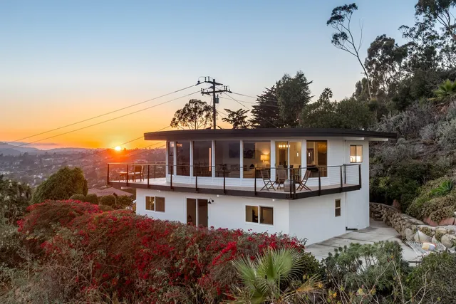 a front view of a house with a porch