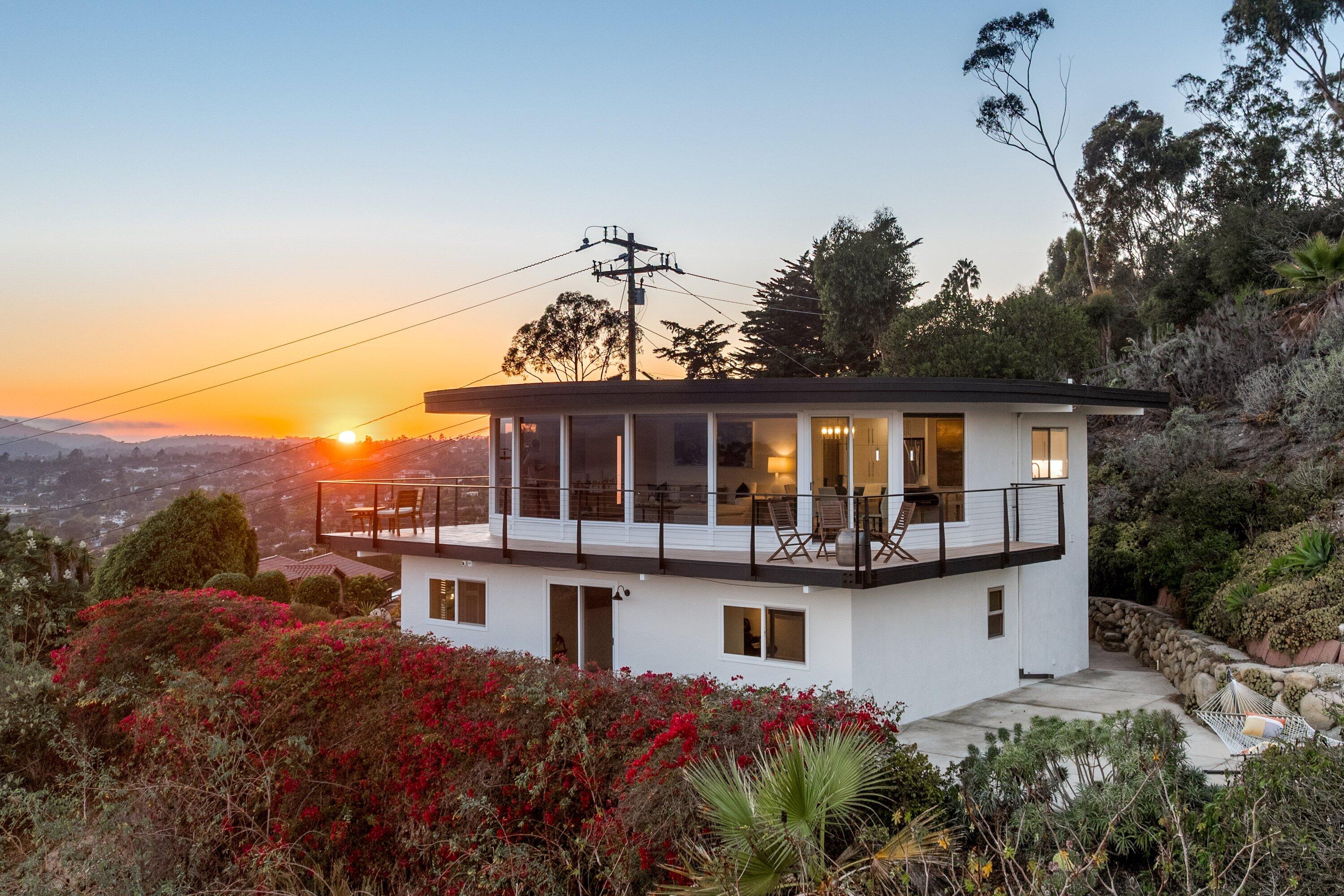 a front view of a house with a porch
