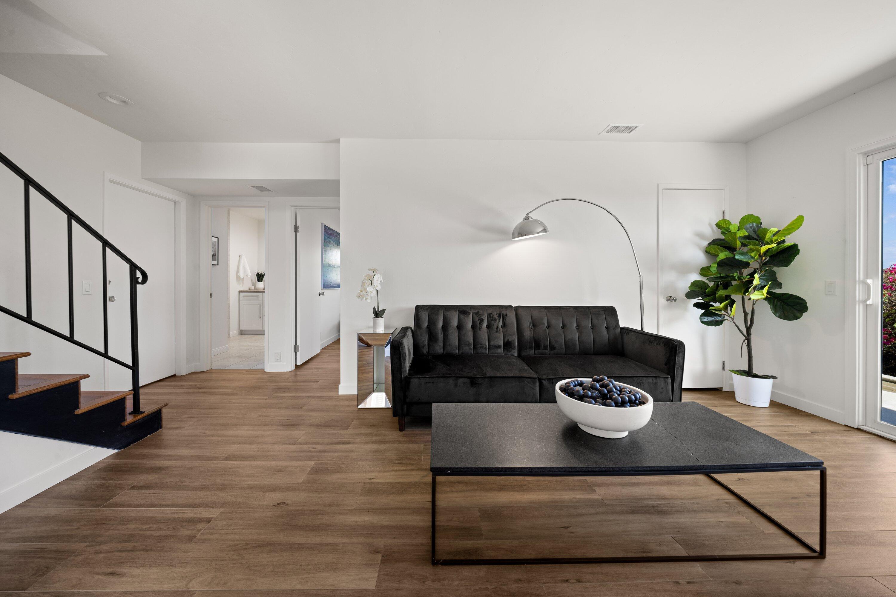 128 Las Alturas Road Santa Barbara, CA 93103 - Photo 20 of 34 a living room with furniture and a potted plant