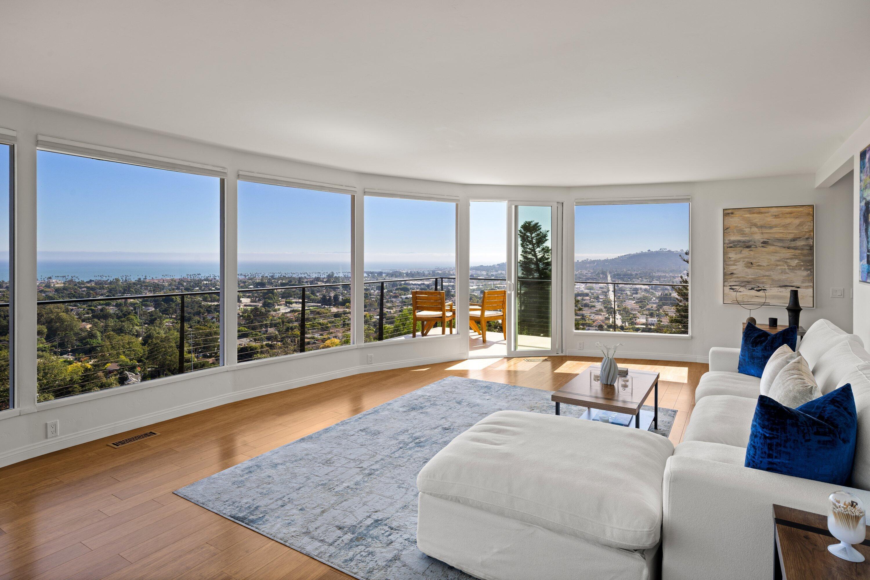 128 Las Alturas Road Santa Barbara, CA 93103 - Photo 2 of 34 a living room with furniture and a large window