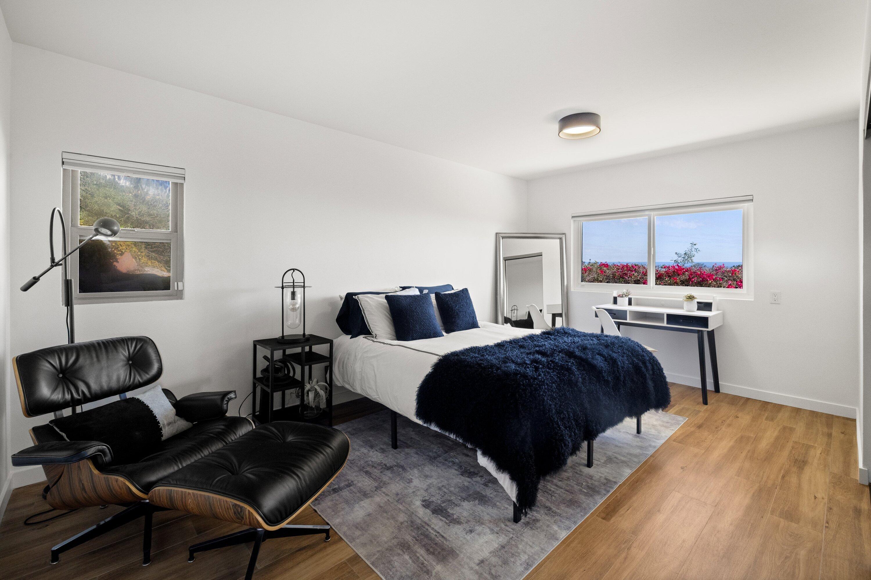 128 Las Alturas Road Santa Barbara, CA 93103 - Photo 24 of 34 a bedroom with bed and a painting on the wall