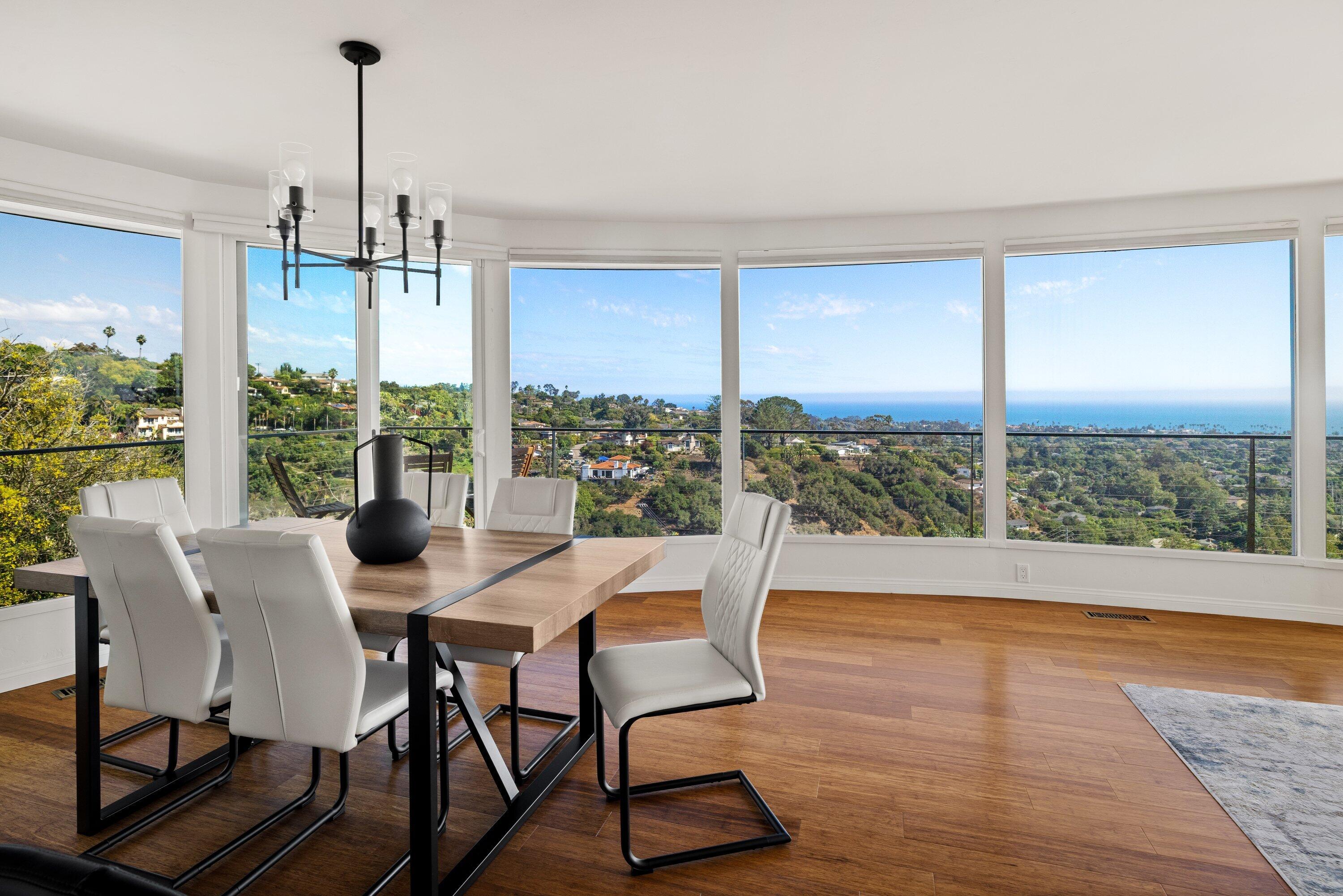 128 Las Alturas Road Santa Barbara, CA 93103 - Photo 3 of 34 a view of a dining room with furniture window and wooden floor