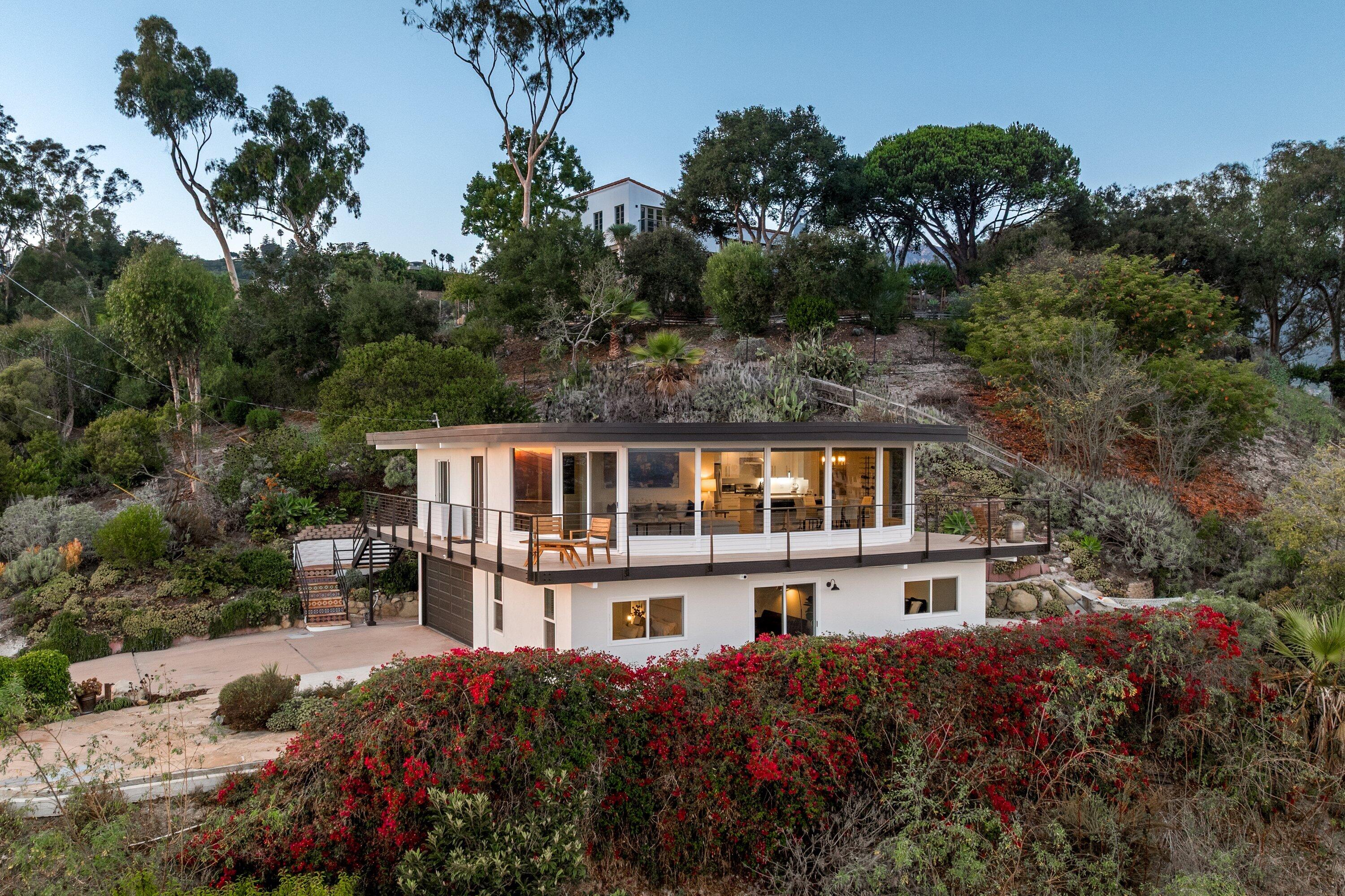 128 Las Alturas Road Santa Barbara, CA 93103 - Photo 34 of 34 front view of a house with a garden