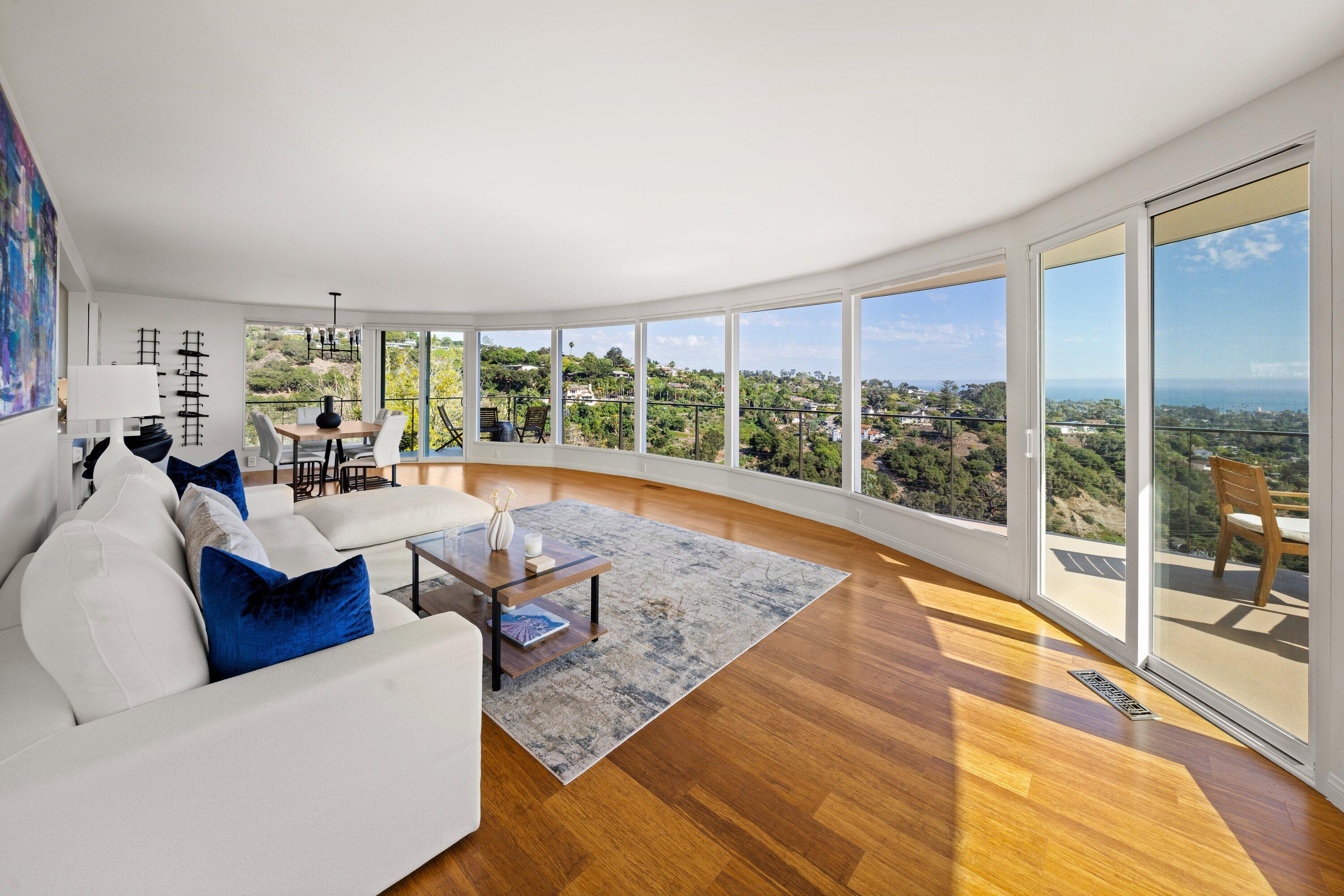 128 Las Alturas Road Santa Barbara, CA 93103 - Photo 8 of 34 a living room with furniture and a large window
