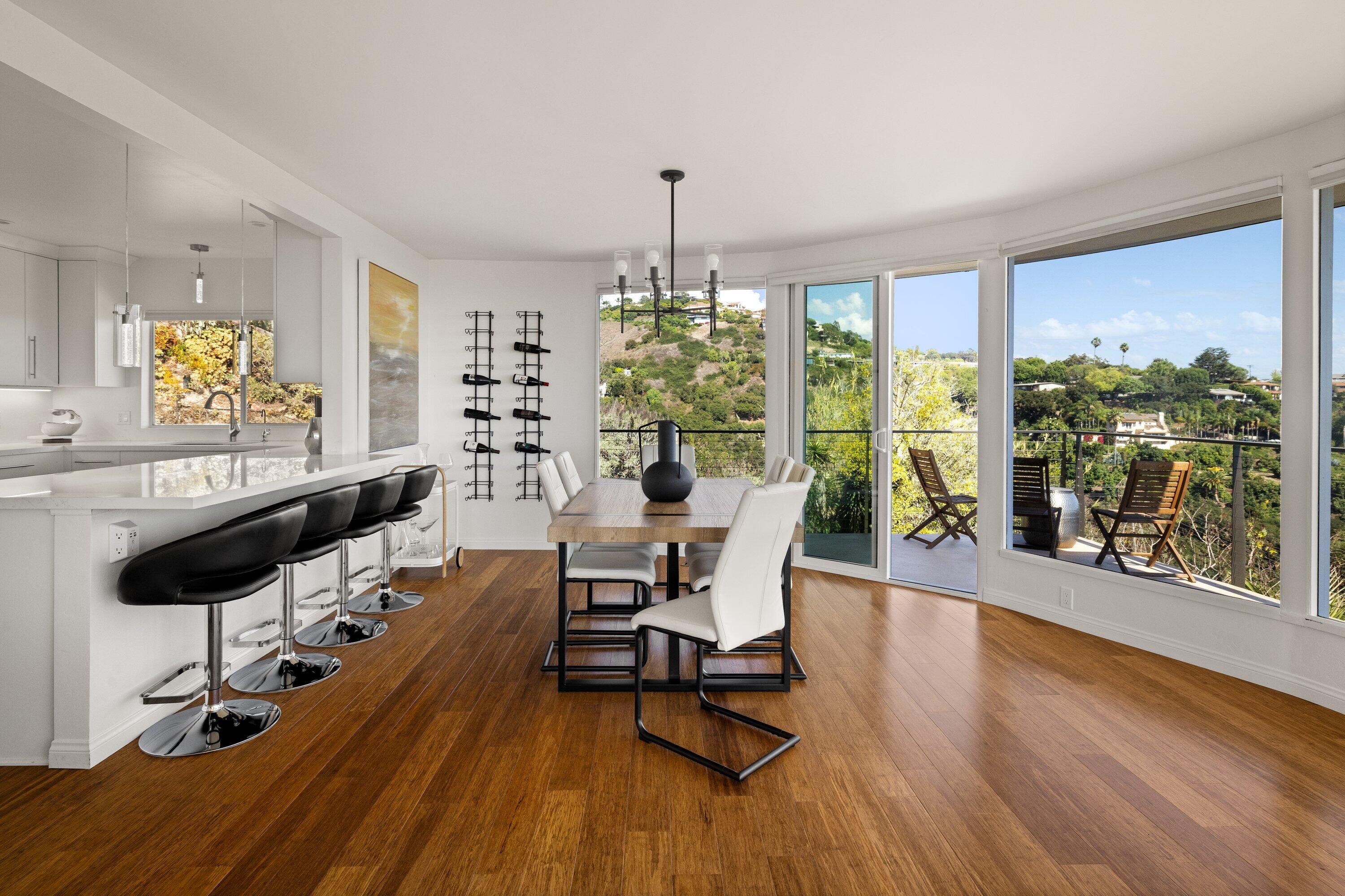 128 Las Alturas Road Santa Barbara, CA 93103 - Photo 9 of 34 a living room with furniture and a large window