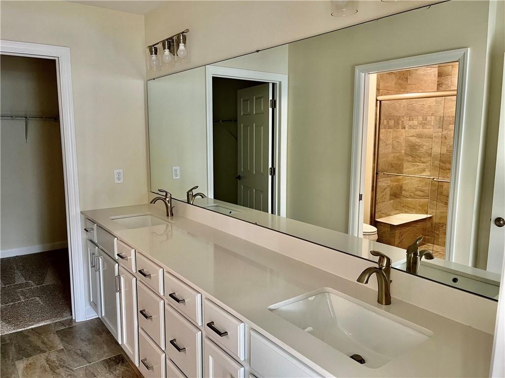 1214 Sandy Ridge Drive Sarver, PA 16055 - Photo 10 of 11 a bathroom with double sink and two mirror