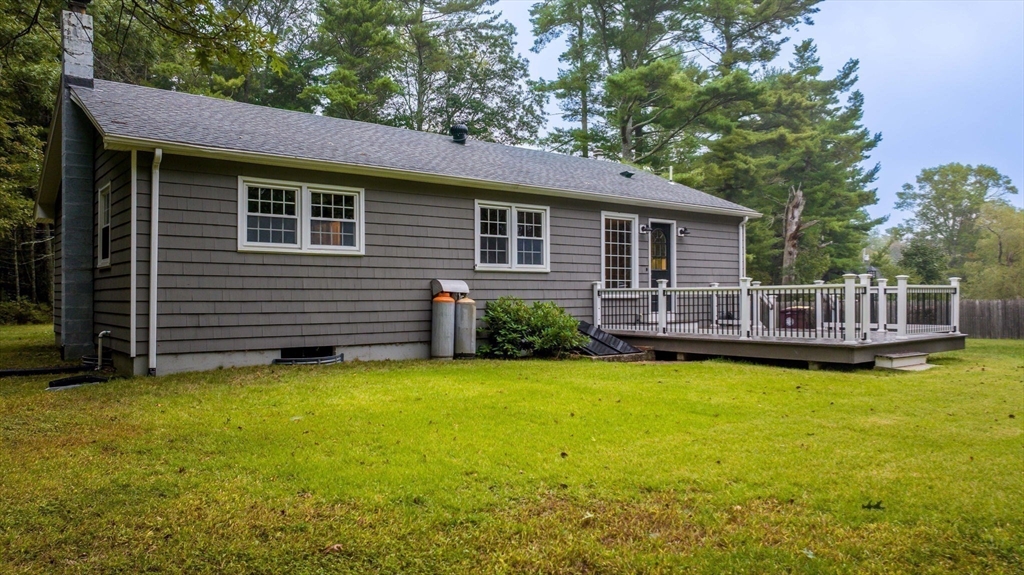 2 Woodland Road Acushnet, MA 02743 - Photo 24 of 26 a view of a house with a backyard
