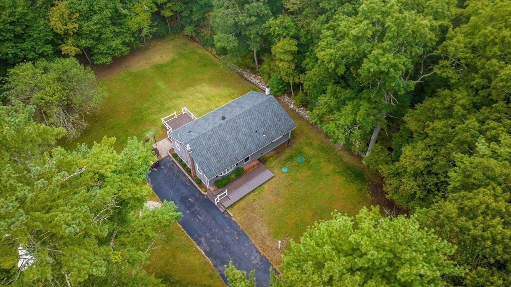 2 Woodland Road Acushnet, MA 02743 - Photo 26 of 26 a view of a yard with plants