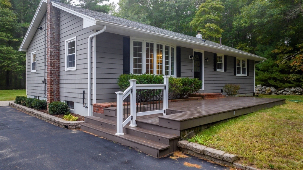 2 Woodland Road Acushnet, MA 02743 - Photo 3 of 26 a view of house with a yard and furniture