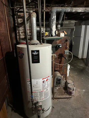 a room with water heater and storage