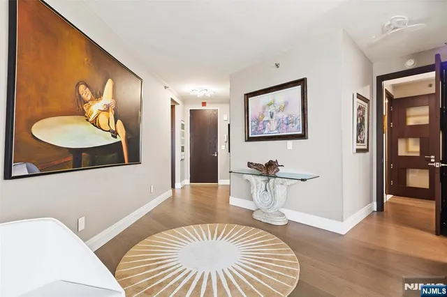 a view of a livingroom with furniture and a table