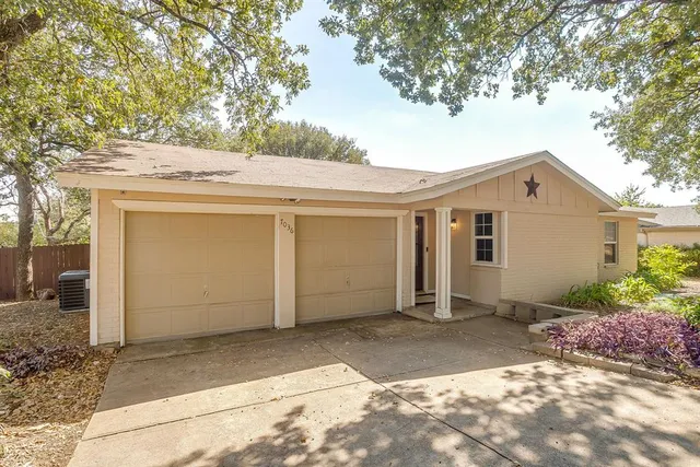 a view of a house with a garage