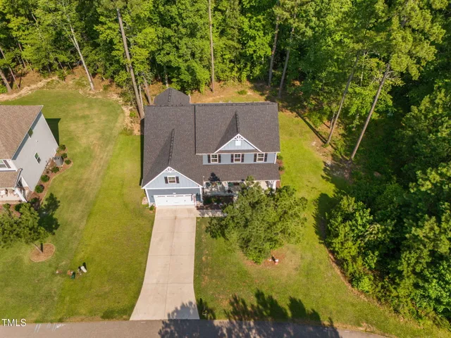 a view of a living room and front door