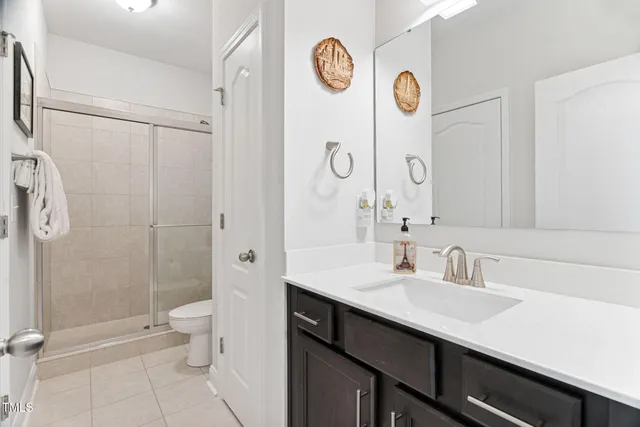 a living room with furniture fireplace and flat screen tv