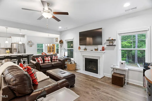 a living room with furniture and a table