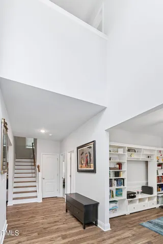 a bathroom with a sink a toilet a shower and a mirror