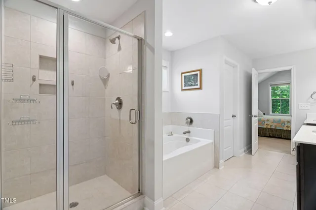 a view of a house with backyard porch and sitting area