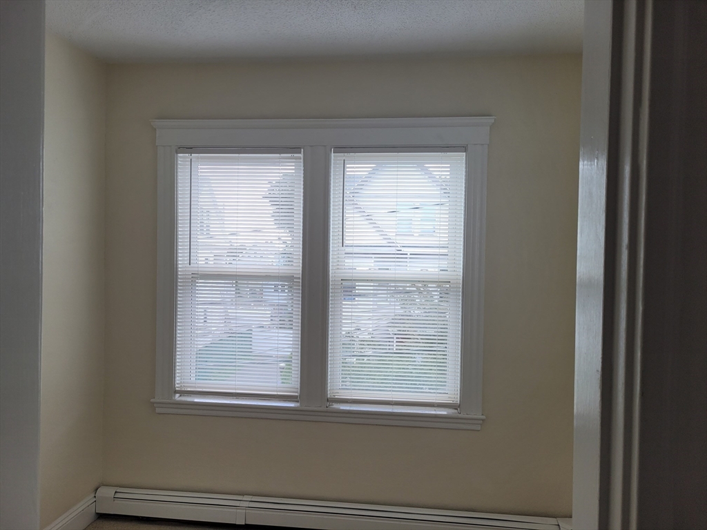 39 Irving Street, Unit 4 Everett, MA 02149 - Photo 2 of 8 a view of a small space and window