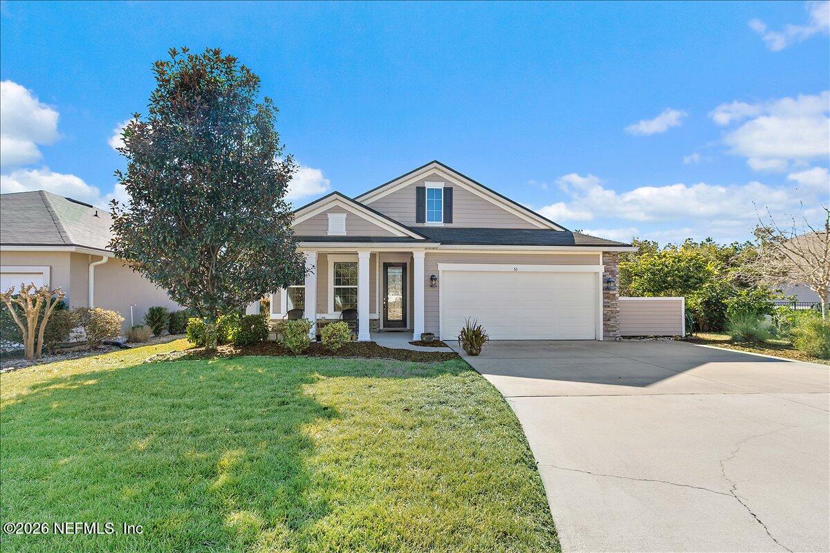 53 Monroe Avenue St. Augustine, FL 32086 - Photo 1 of 26 a front view of a house with a yard