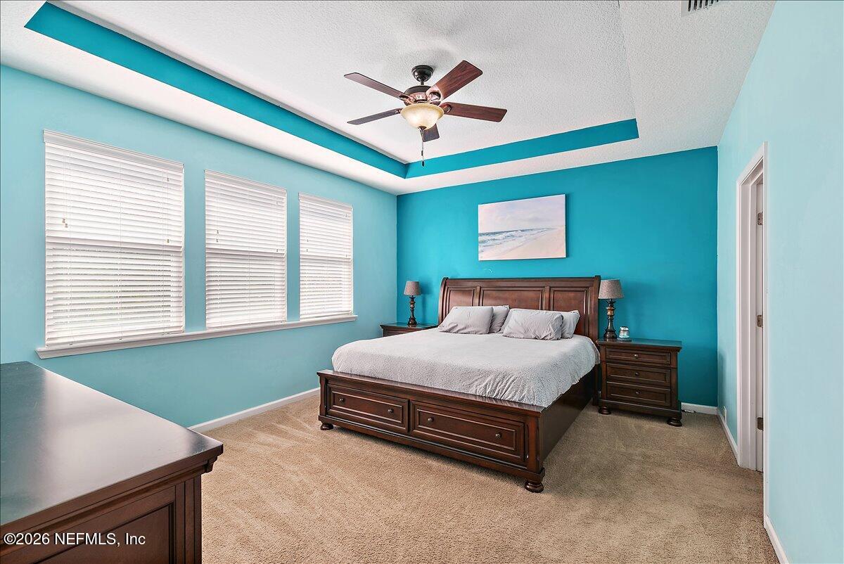 53 Monroe Avenue St. Augustine, FL 32086 - Photo 15 of 26 a bedroom with a bed and window