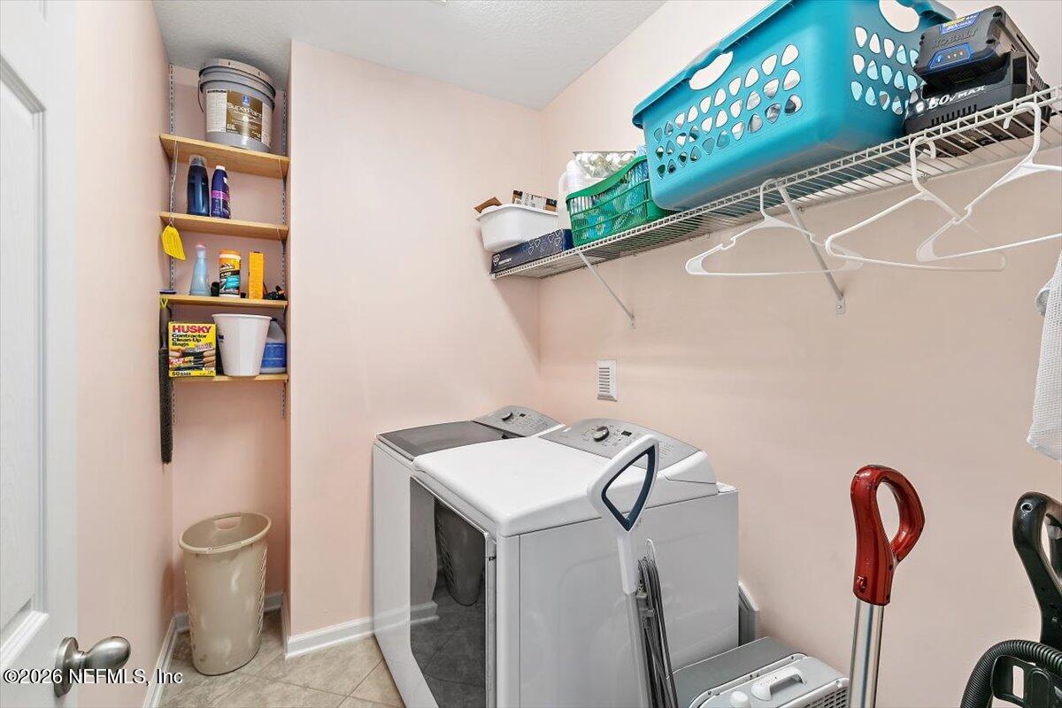 53 Monroe Avenue St. Augustine, FL 32086 - Photo 21 of 26 a utility room with dryer and washer
